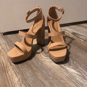 Nude strappy platform heels